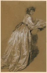 Staande vrouw in een witte jurk